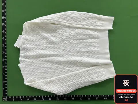 QC photo: Pony Twist Knitted Pullover