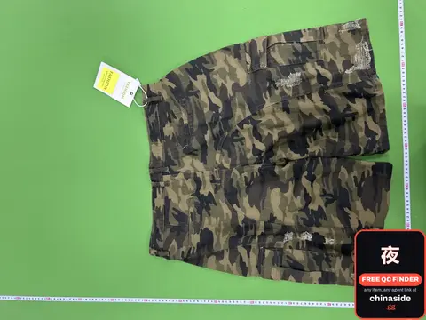 Distressed Camouflage Shorts