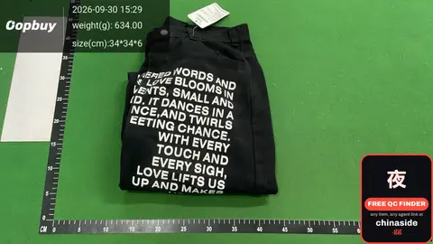 Black Jean Shorts With White Text